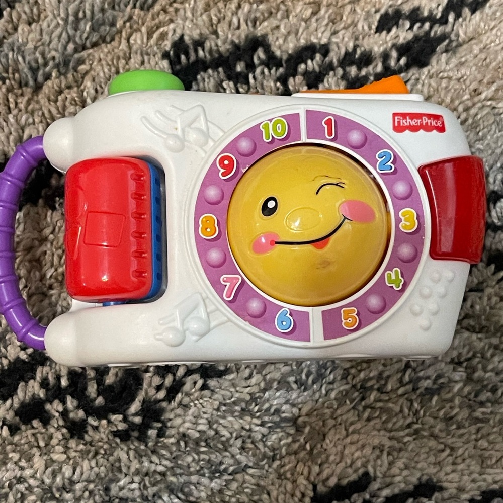 Fisher-Price Musical Learning Toy with Red and Purple